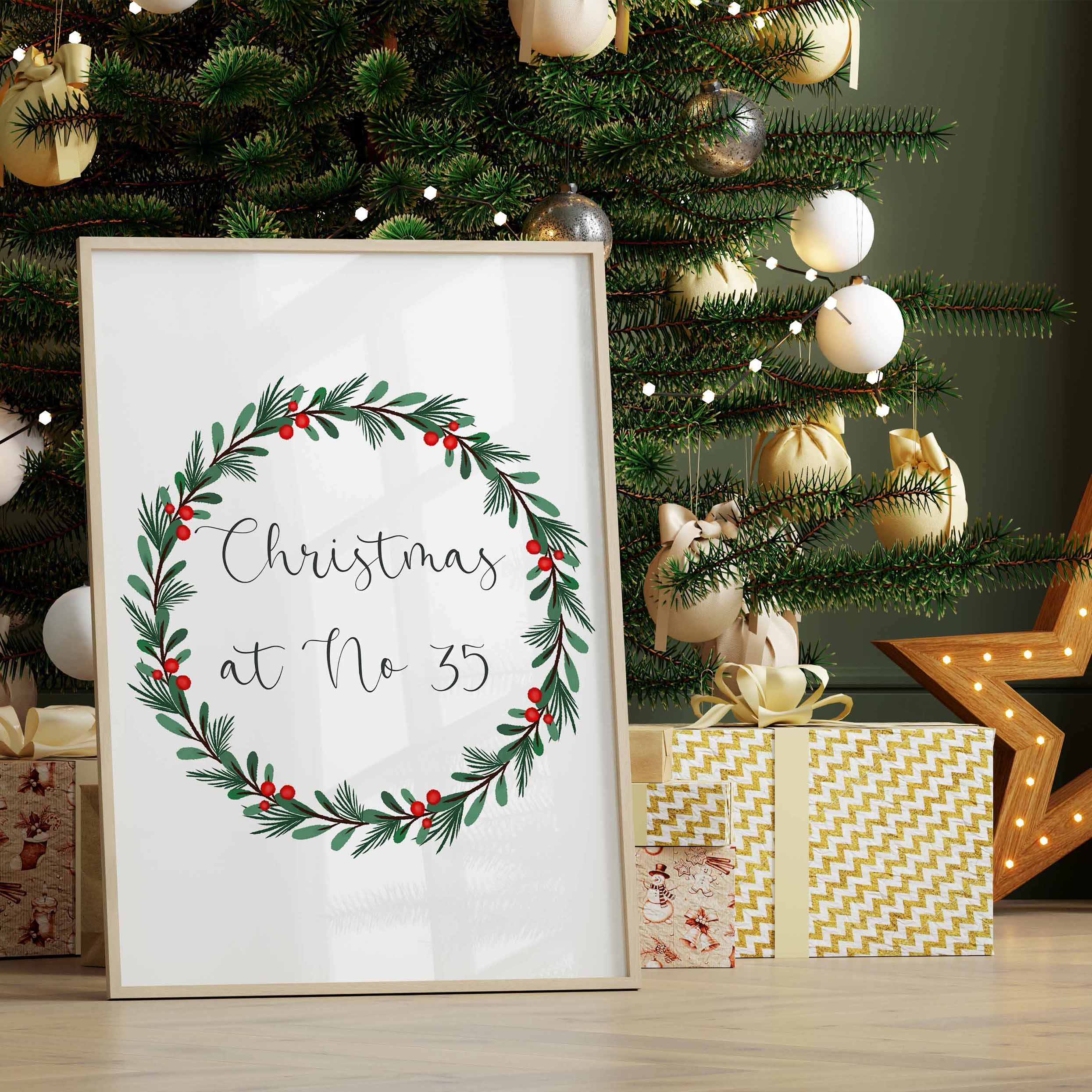 A soft, watercolour wreath print personalised with your house number. Ideal Christmas wall art or gift.