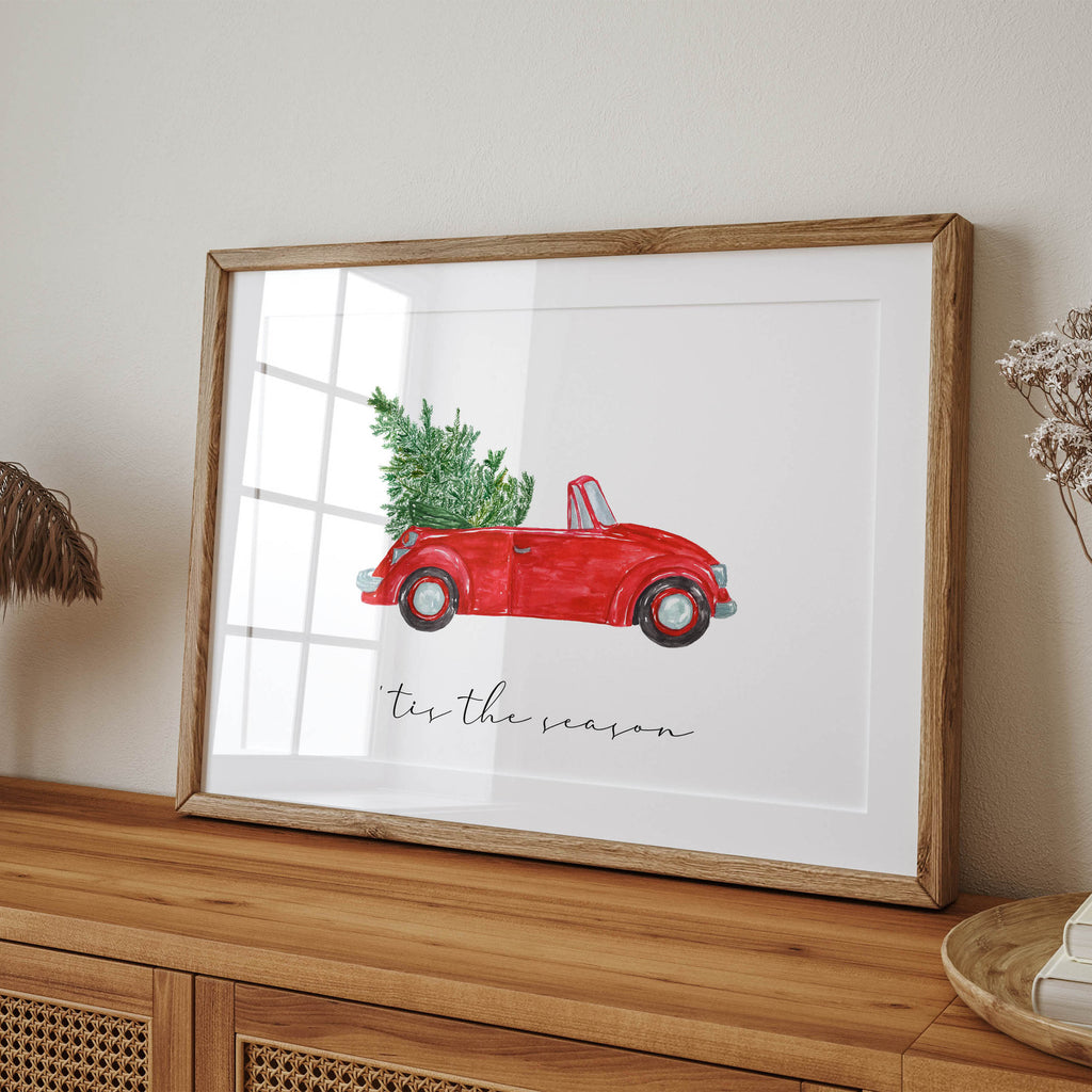 Beautiful watercolour artwork of a car carrying a Christmas tree. A timeless print filled with holiday cheer and winter warmth.