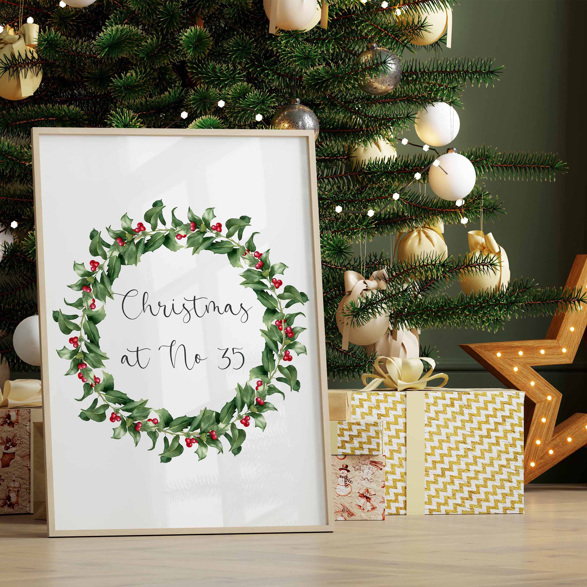 A custom Christmas print with a winter wreath design, personalised with your house name or number. Perfect holiday home decoration.