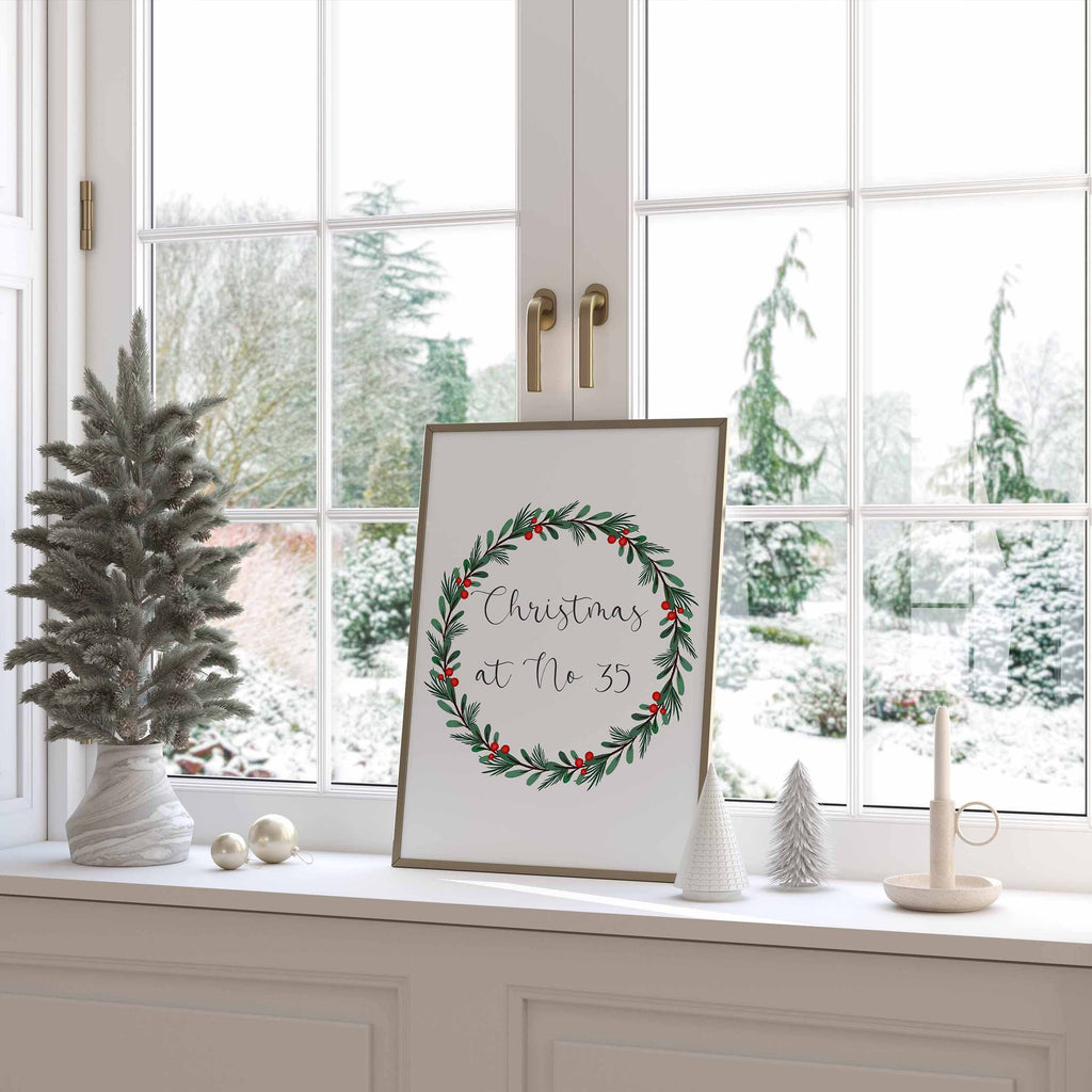Elegant Christmas wall print featuring a wreath design and your custom house number. A festive touch for any home.
