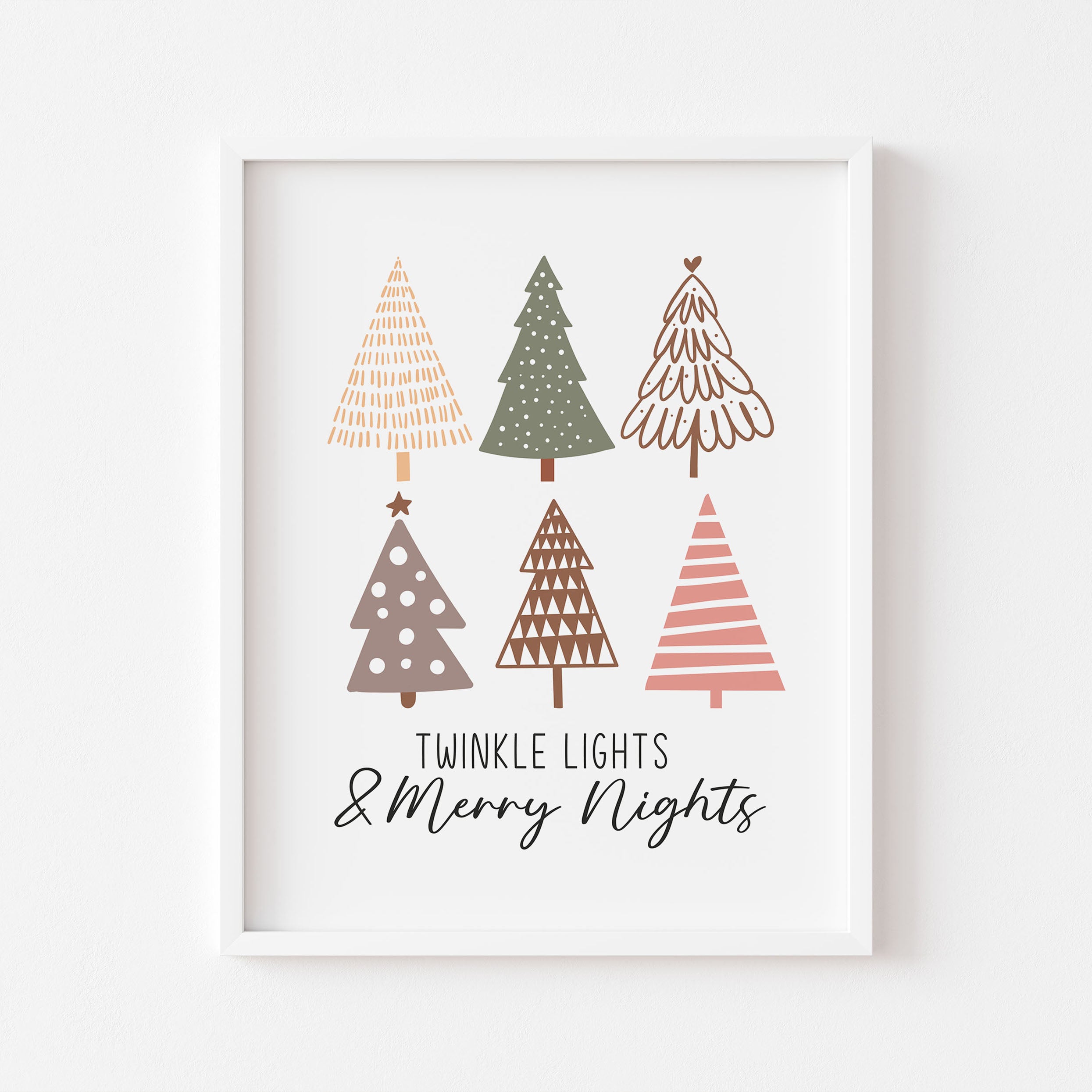 A festive print featuring three Christmas trees and the phrase ‘Twinkle Lights and Merry Nights’. Perfect wall art for the holiday season.