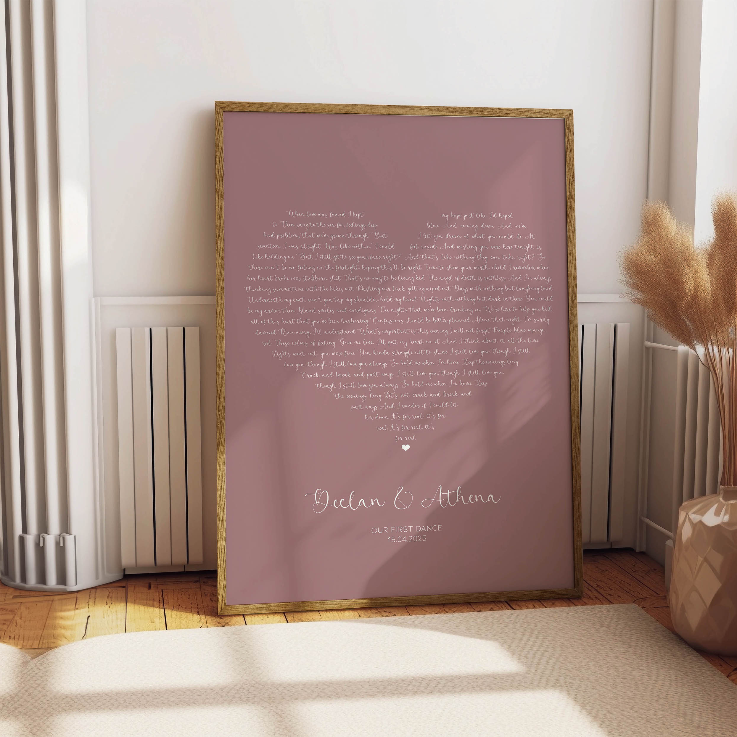 Celebrate your love with a custom heart-shaped lyric print featuring your first dance song, couple names and wedding date.