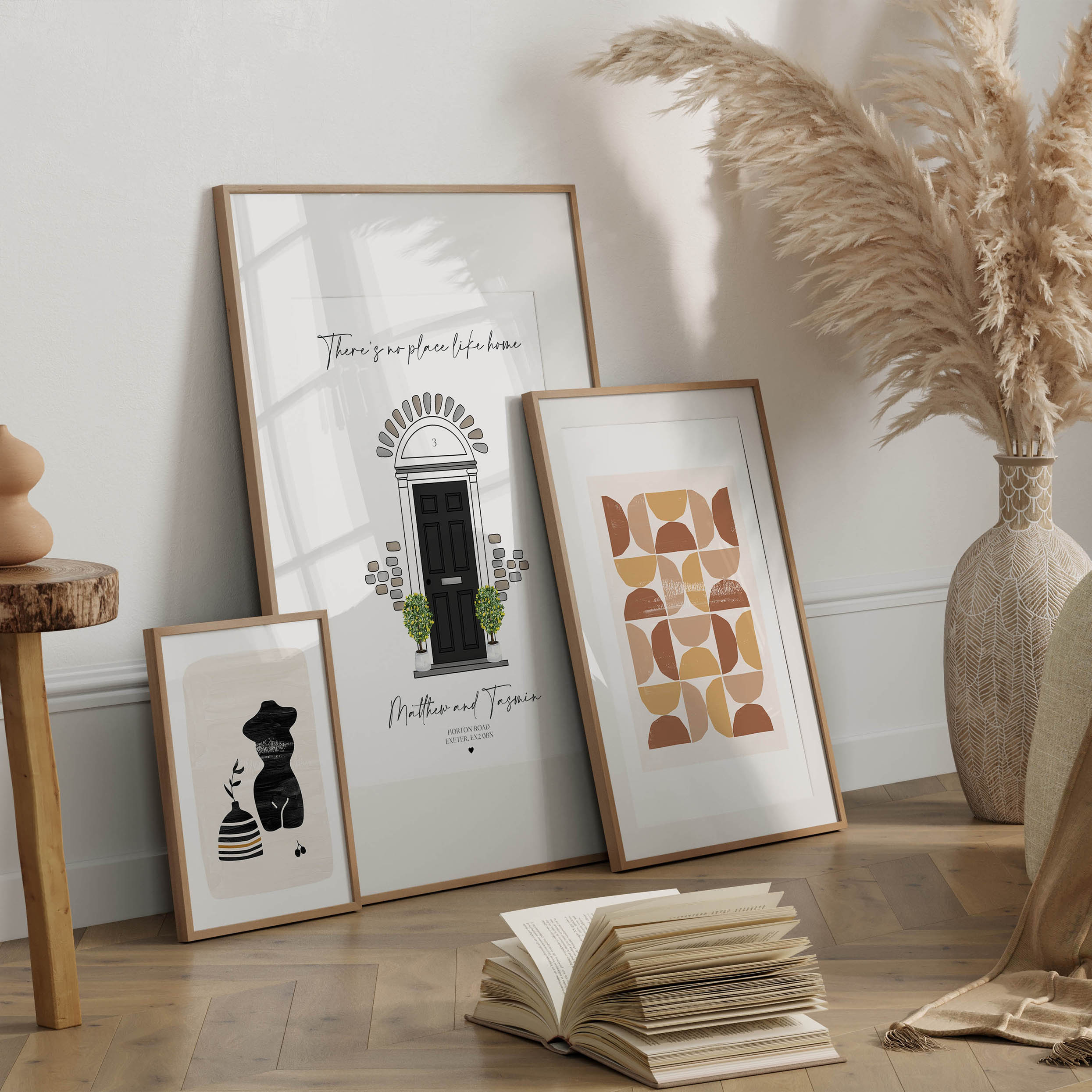 Close-up view showing illustrated door and family names on personalised print