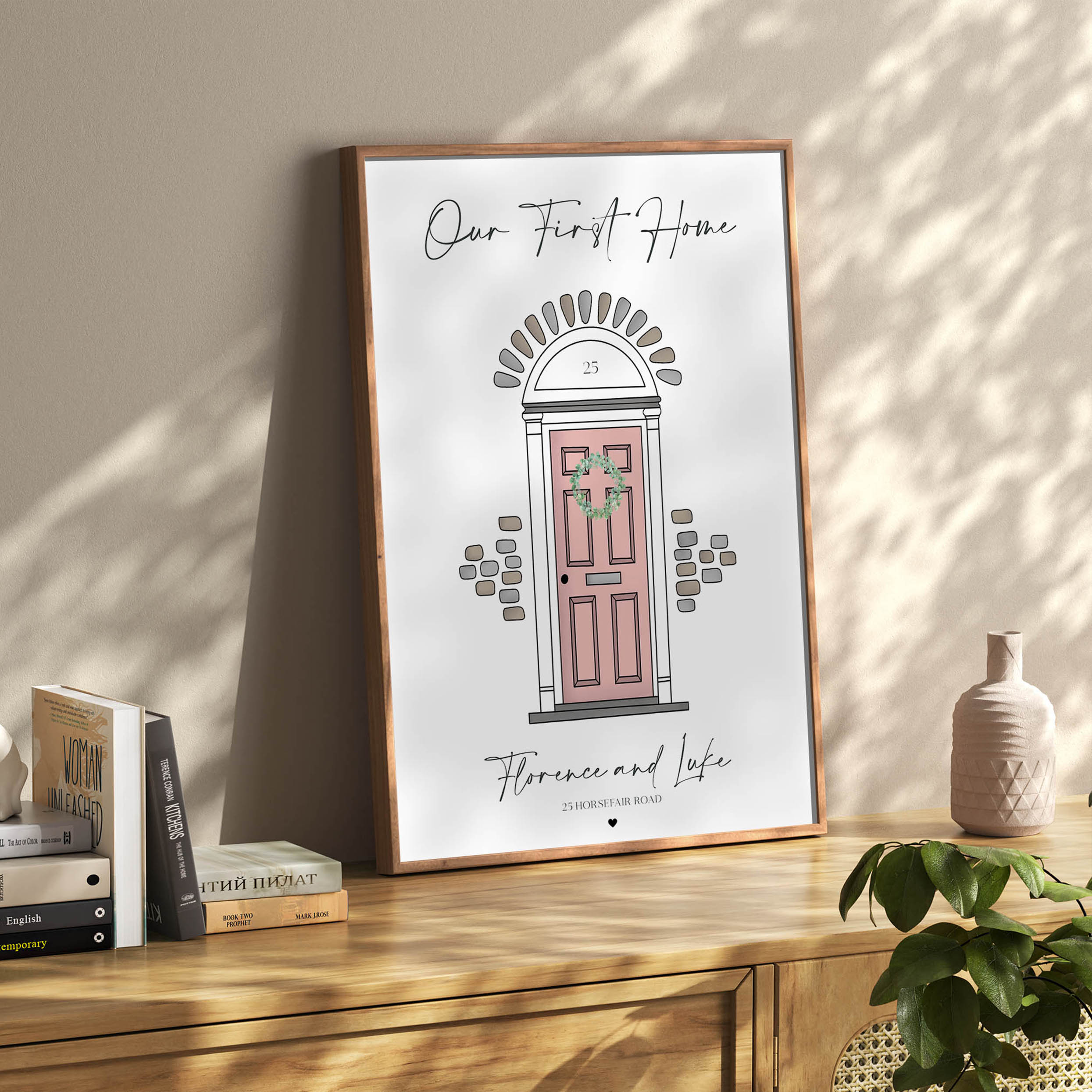 Framed personalised “Our First Home” front door wall art displayed in home