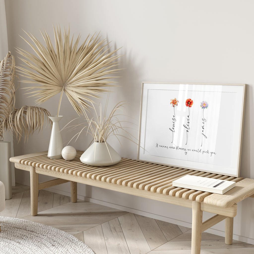 Unframed personalised Nana birth flower print laid flat on wooden surface