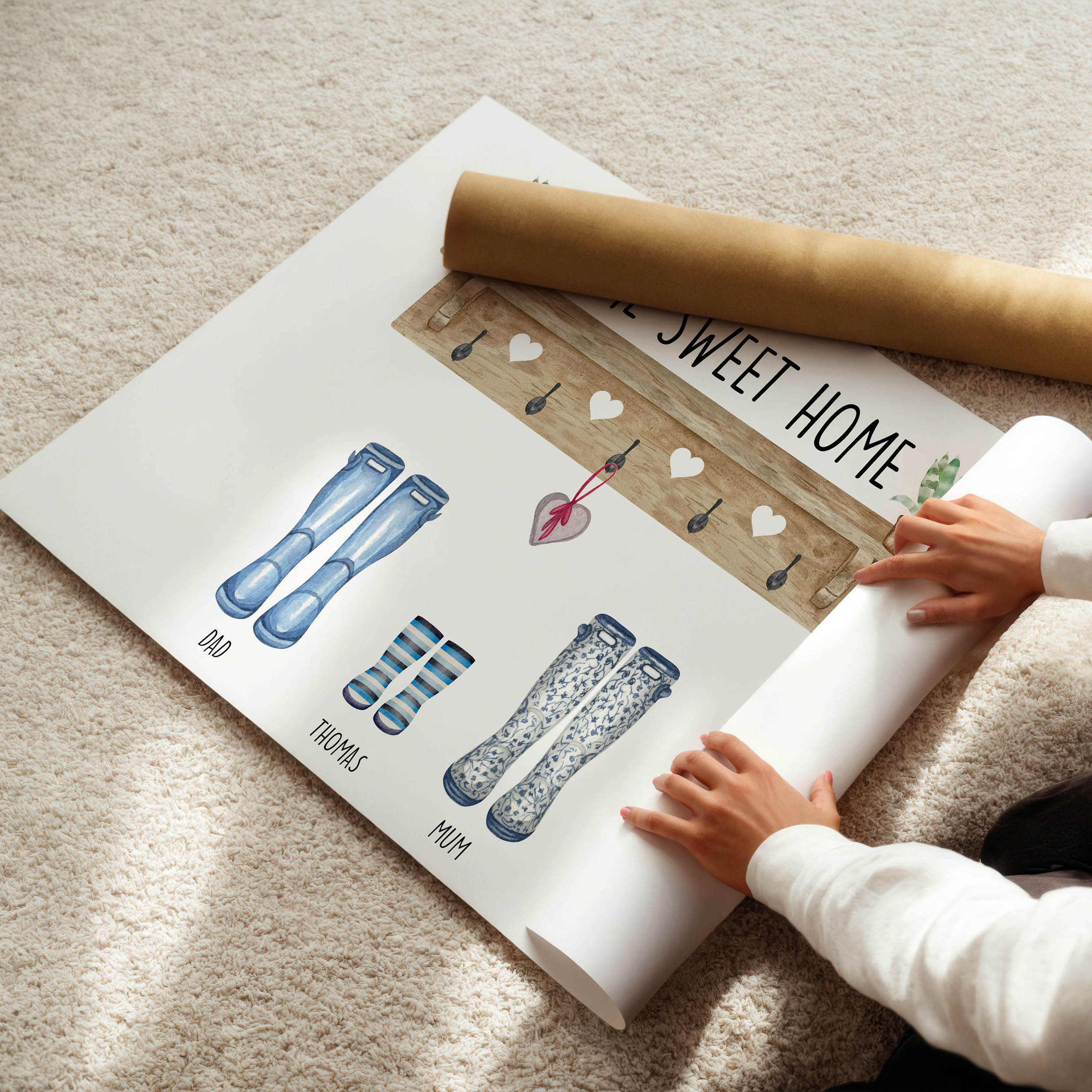 Gift-wrapped personalised Our Family Welly and Coat Print ready for gifting